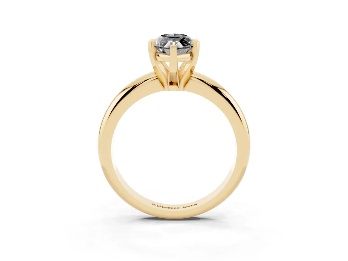 Fancy Black Marquise Cut Diamond Solitaire Engagement Ring with Round Band and Four-Prong Setting Yellow gold