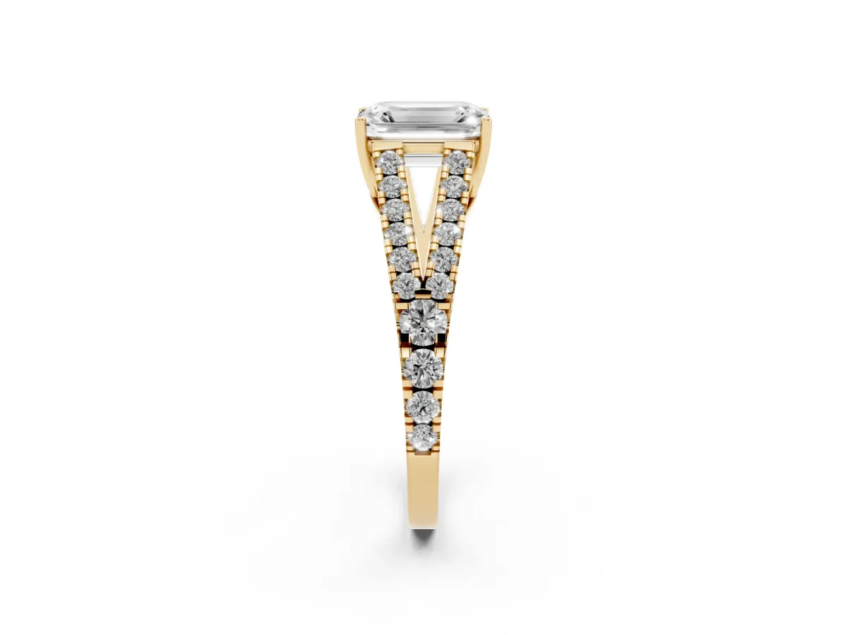 Emerald Cut Diamond Split Shank Engagement Ring with Round Pavé and Prong Setting Yellow gold
