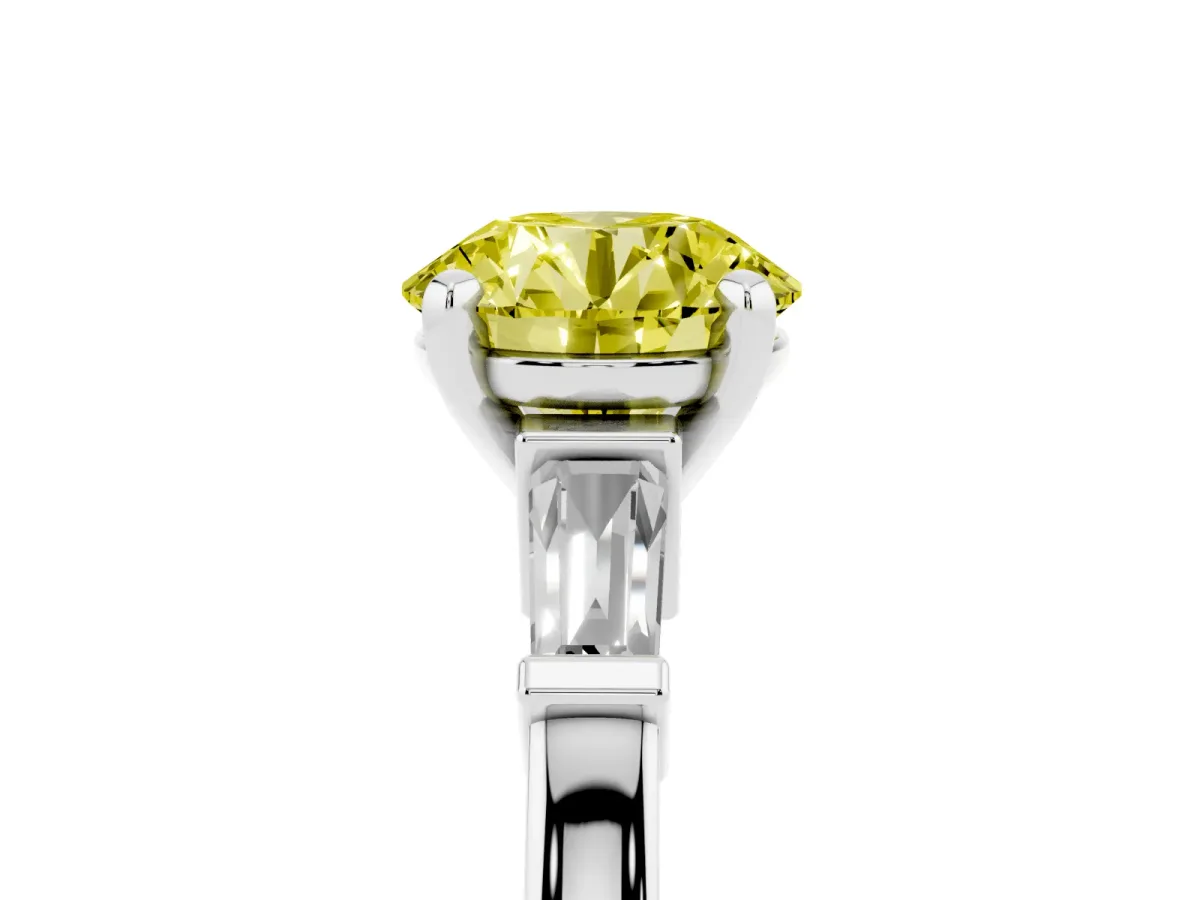 Fancy Yellow Round Cut Cut Diamond Solitaire Ring with Tapered Baguette Accents and Four-Prong Setting White gold