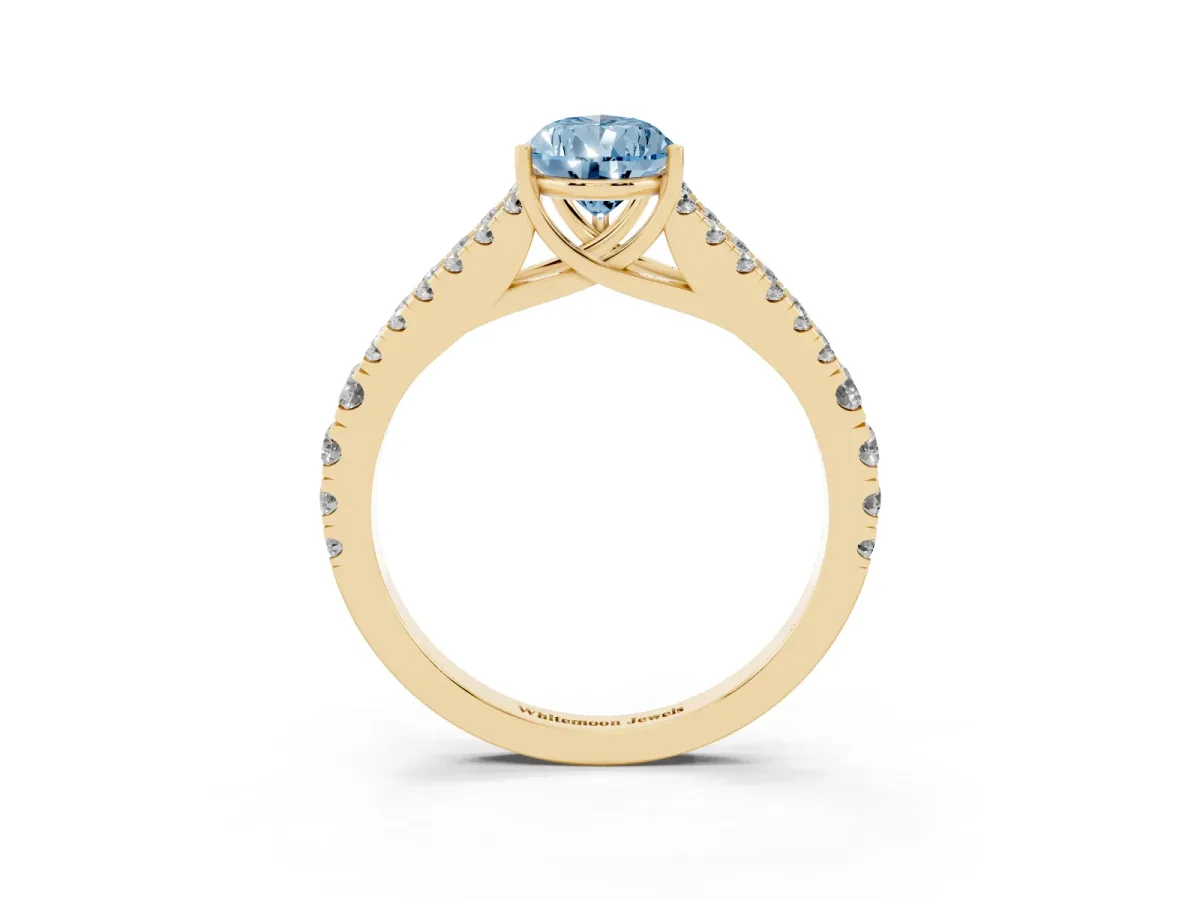 Fancy Blue Pear Cut Diamond Split Shank Pavé Engagement Ring with Four-Prong Setting Yellow gold