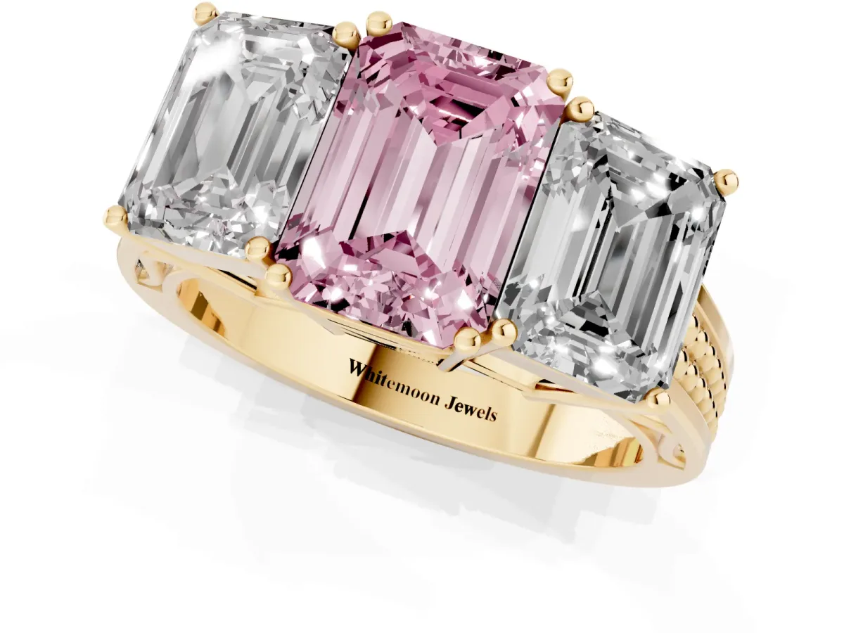 Fancy Pink Emerald Cut Diamond Three-Stone Ring with Prong Setting and Textured Band Yellow gold