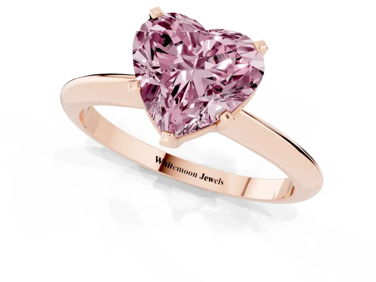 Fancy Pink Heart Cut Cut Solitaire Ring with Four-Prong Setting on a Classic Band Rose gold