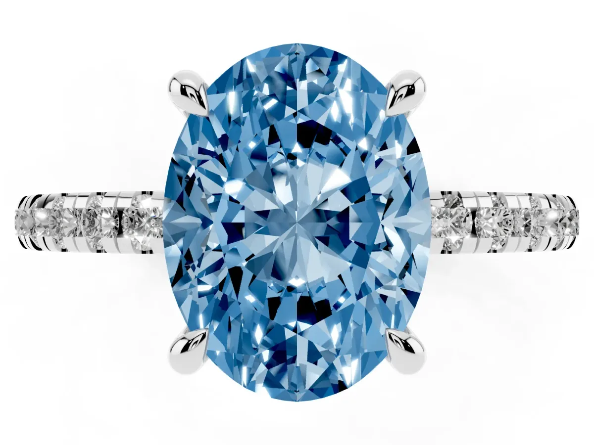 Fancy Blue Oval Cut Diamond Brilliant Solitaire Ring with Pavé Band and Four-Prong Setting Platinum