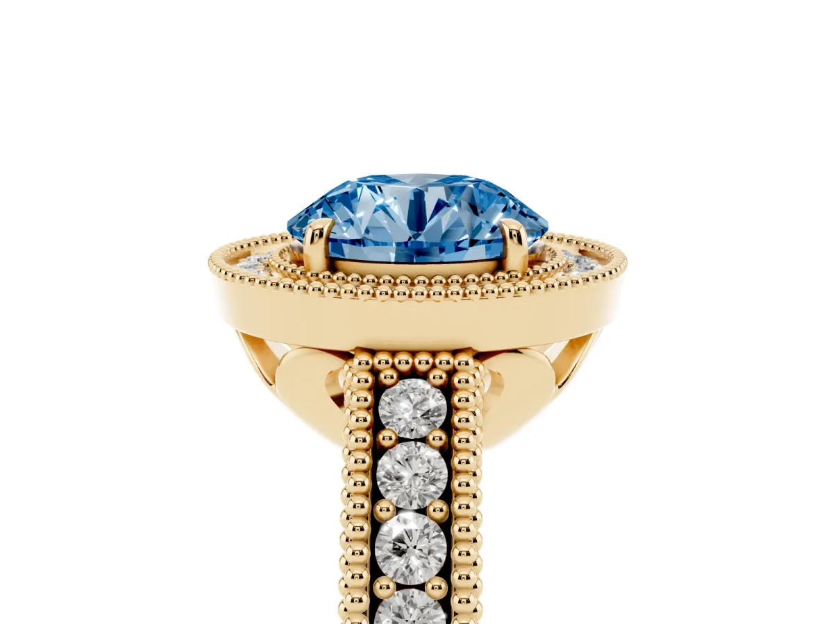 Fancy Blue Round Cut Cut Halo Diamond Ring with Pavé Band and Four-Prong Setting Yellow gold