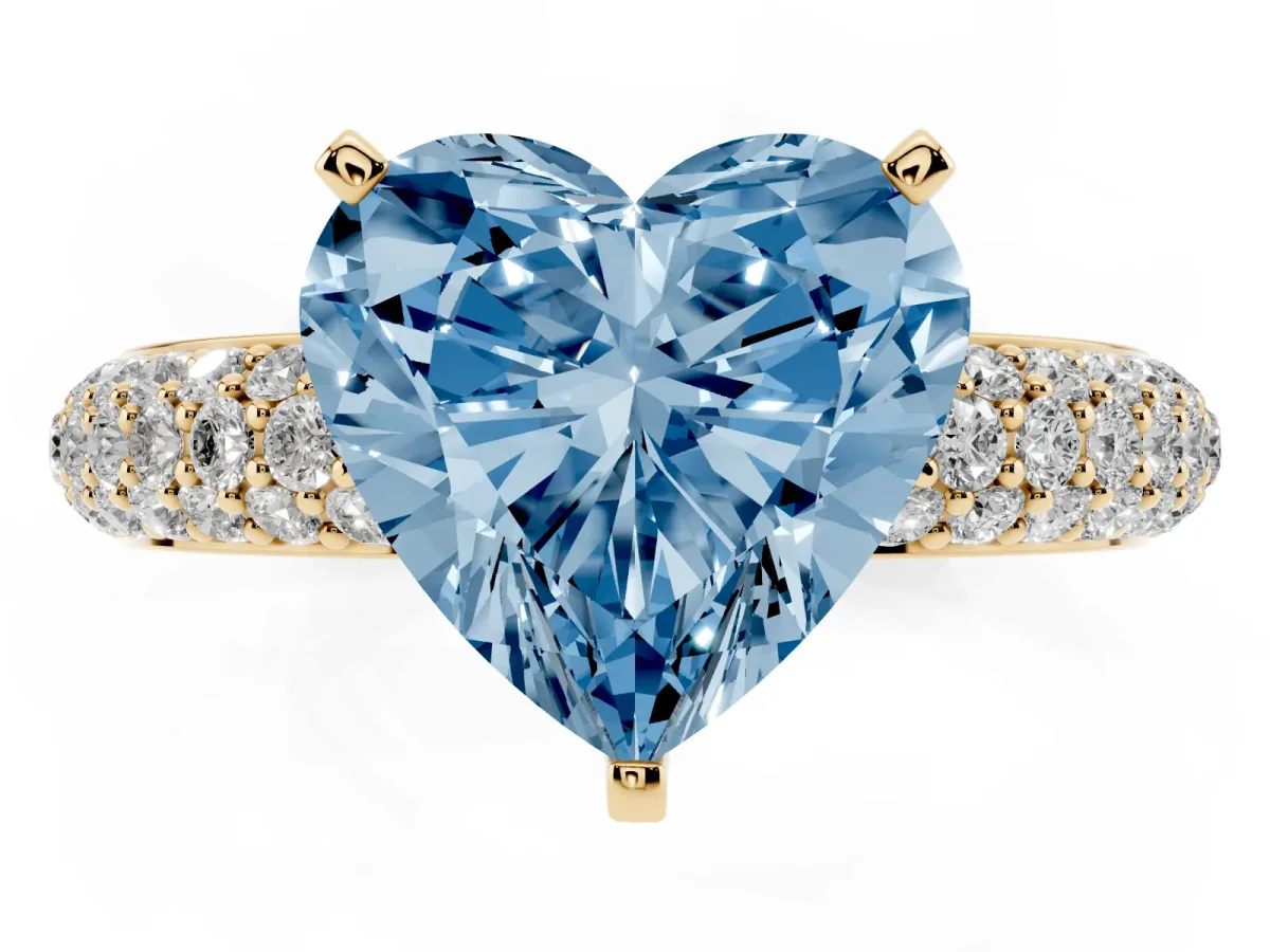 Fancy Blue Heart Cut Diamond Solitaire Ring with Prong Setting and Pavé Band Yellow gold