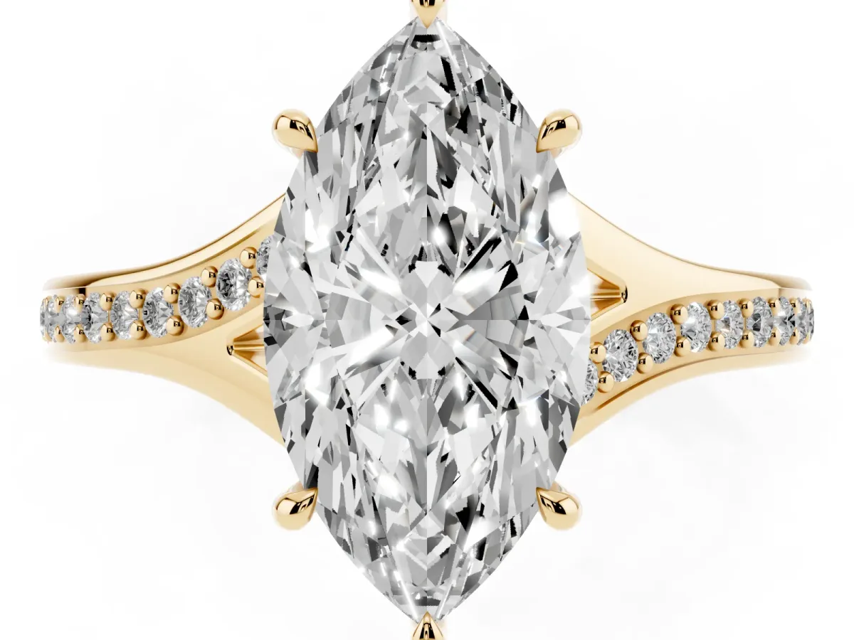 Marquise Cut Diamond Solitaire Ring with Pavé Band and Prong Setting Yellow gold