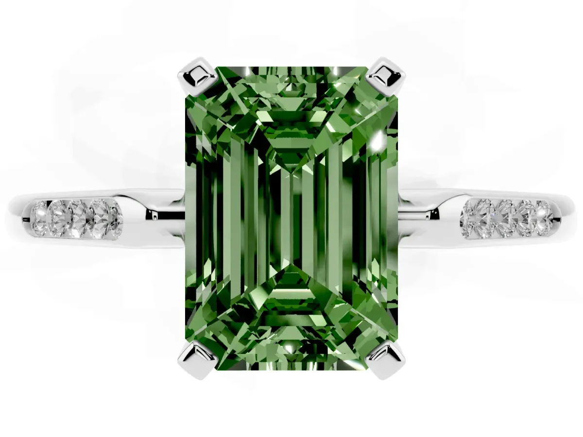 Fancy Green Emerald Cut Diamond Solitaire Ring with Channel Set Round Band and Prong Setting Silver