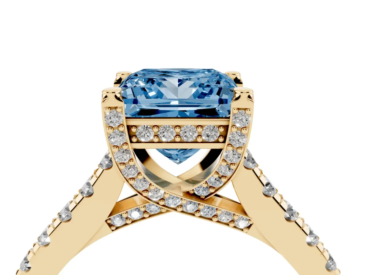 Fancy Blue Princess Cut Brilliant Diamond Solitaire with Pavé Band and Four-Prong Setting Yellow gold