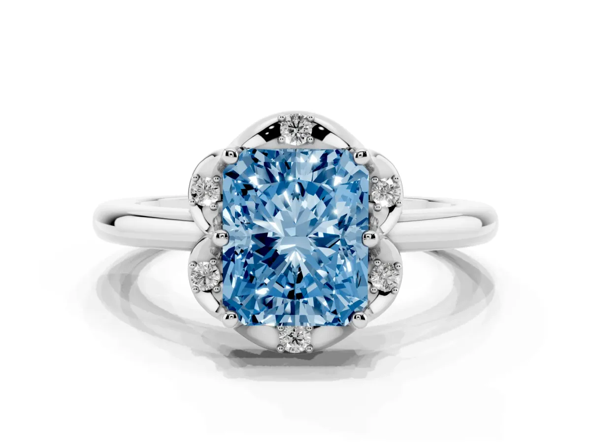 Fancy Blue Radiant Cut Halo Diamond Ring with Round Cluster Setting, Solitaire Band, and Four-Prong Setting Platinum