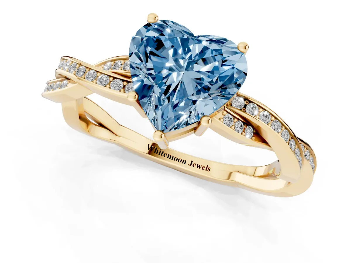 Fancy Blue Heart Cut Solitaire Twisted Pave Diamond Ring with Four-Prong Setting Yellow gold