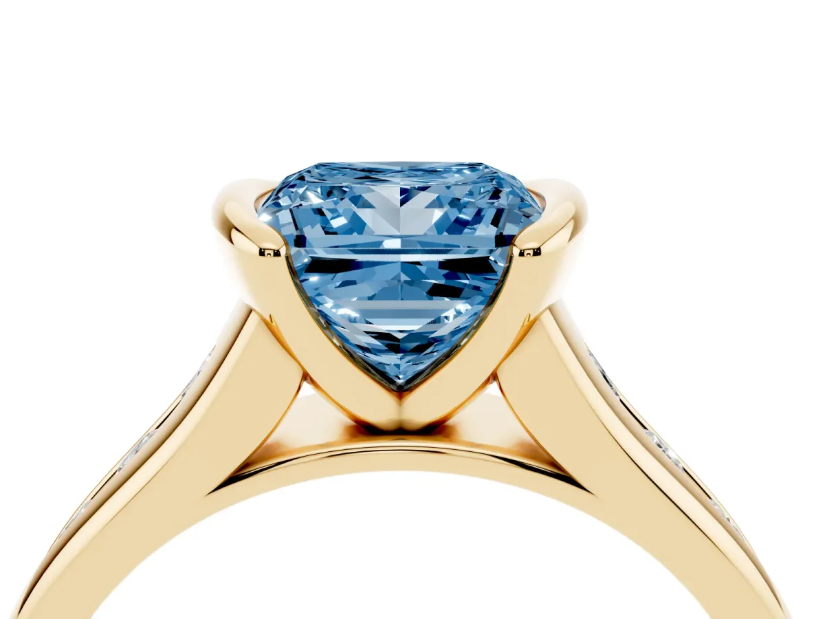Fancy Blue Princess Cut Solitaire Bezel-Set Diamond Ring with Channel-Set Band Yellow gold