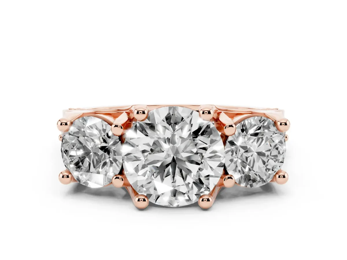 Round Cut Diamond Three-Stone Ring with Channel Set Band and Four-Prong Setting Rose gold
