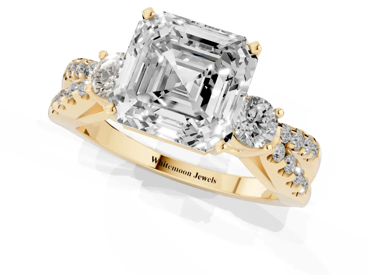 Asscher Cut Diamond Three-Stone Ring with Pavé Split Shank and Four-Prong Setting Yellow gold