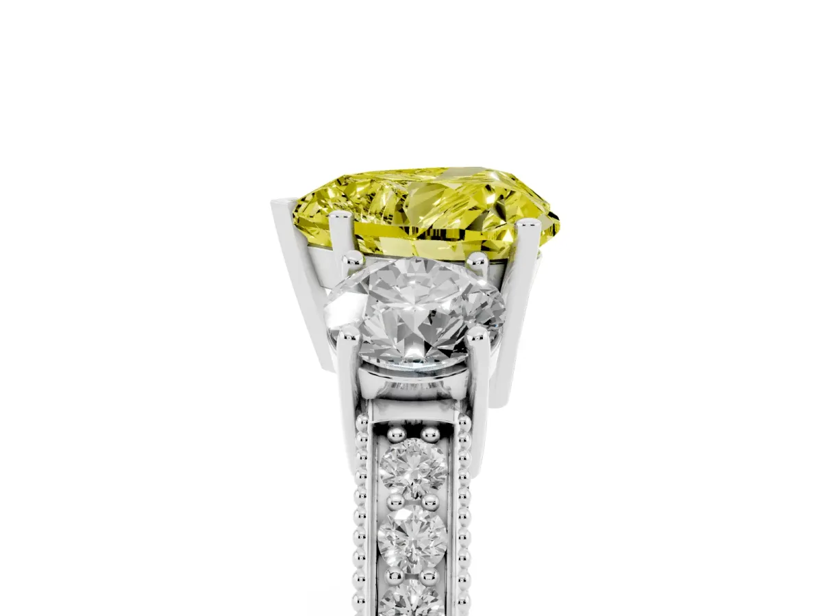 Fancy Yellow Heart Cut Three-Stone Diamond Ring with Pavé Band and Four-Prong Setting Silver