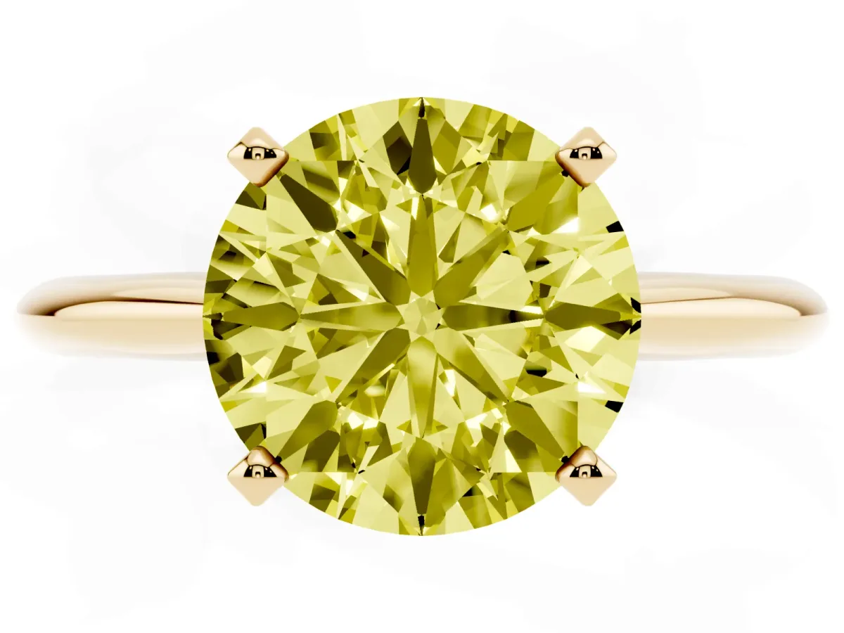 Fancy Yellow Round Cut Cut Solitaire Ring with Four-Prong Setting on a Classic Band Yellow gold
