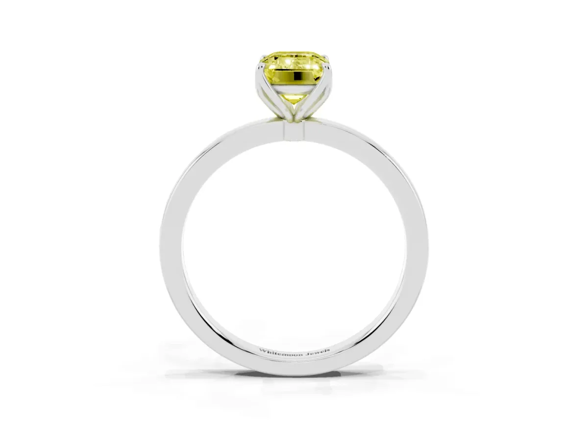 Fancy Yellow Emerald Cut Diamond Solitaire Ring with Thin Band and Prong Setting Silver