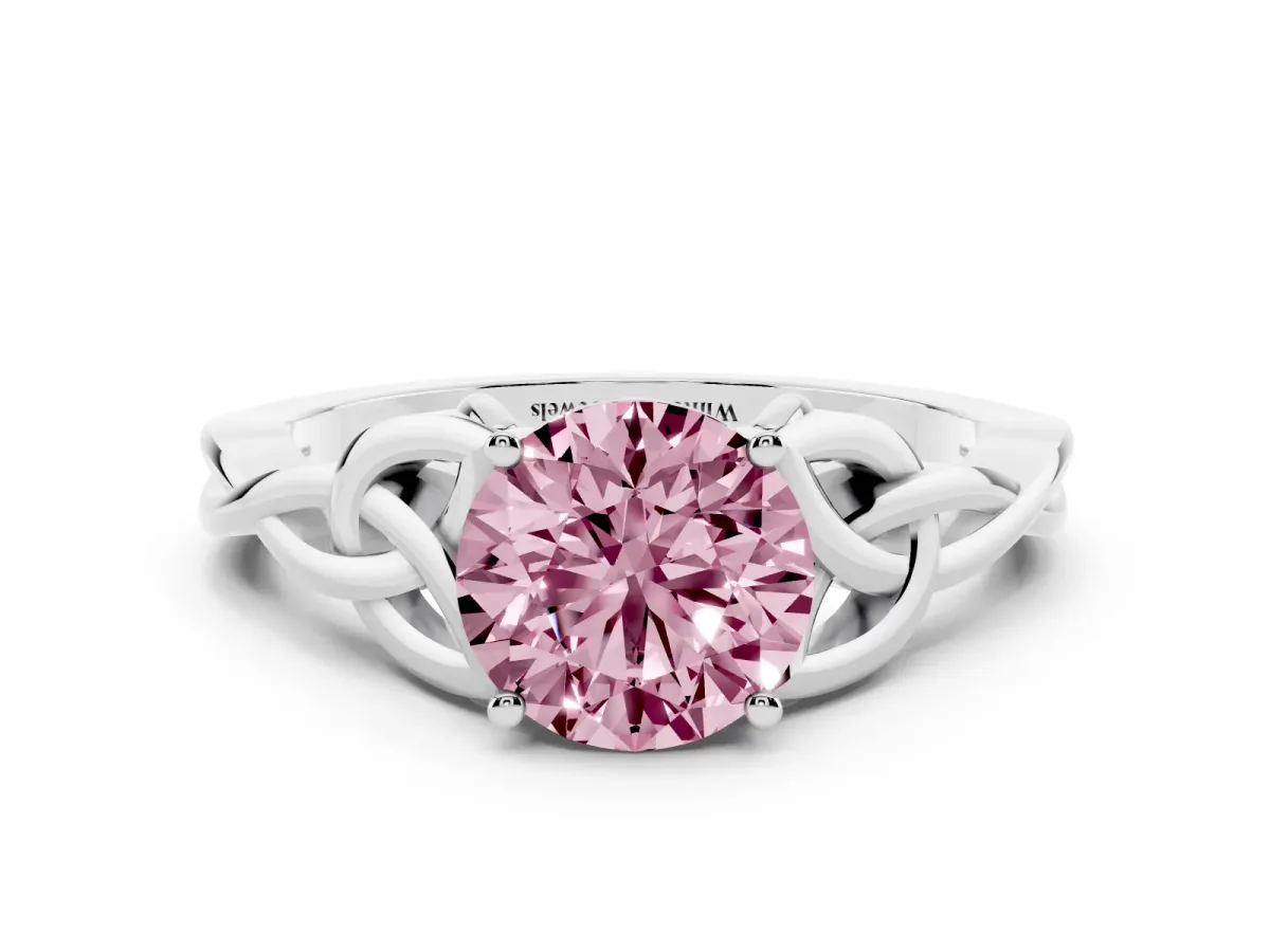 Fancy Pink Round Cut Diamond Solitaire Engagement Ring with Celtic Knot Band and Four-Prong Setting Silver