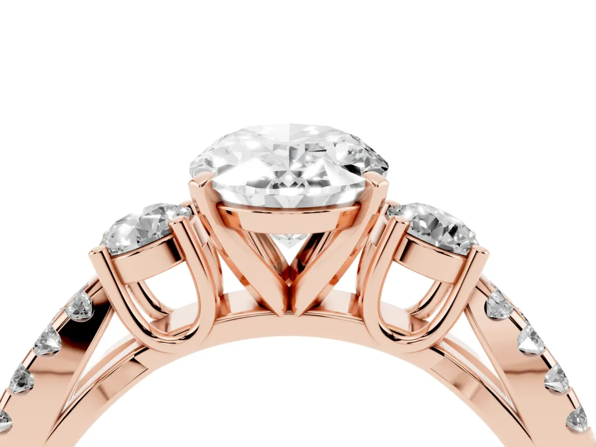 Oval Cut Diamond Three-Stone Ring with Pavé Split Shank and Four-Prong Setting Rose gold