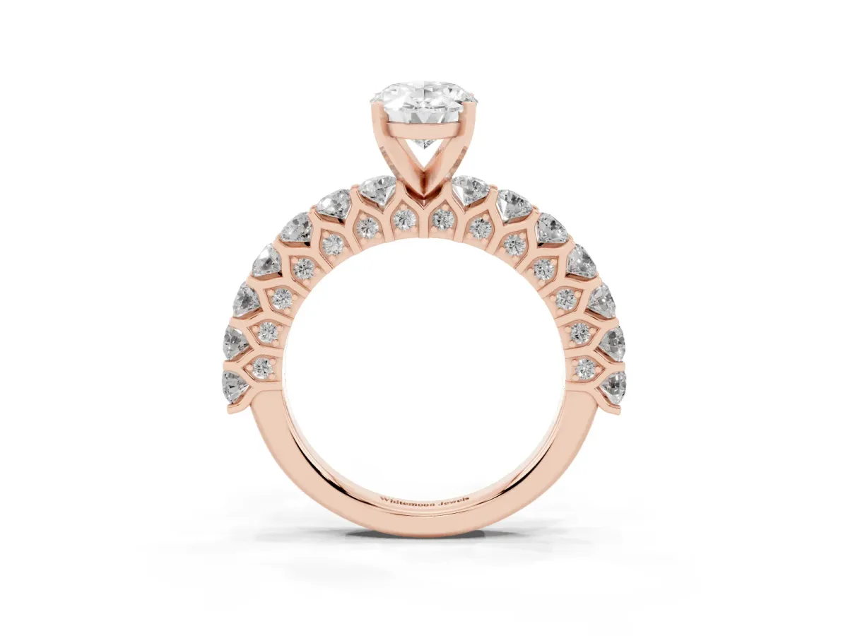 Oval Cut Diamond Solitaire Ring with Shared Prong Pavé Band and Four-Prong Setting Rose gold