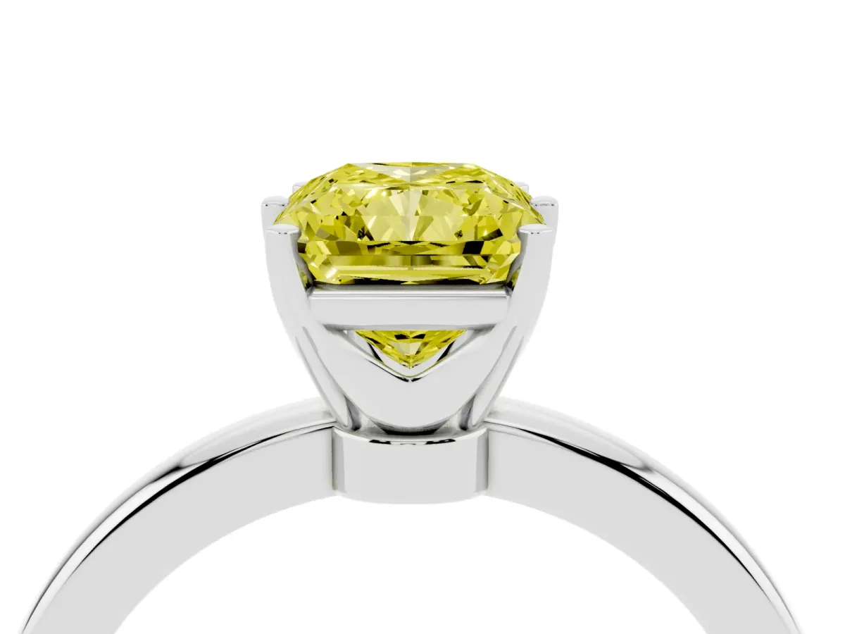 Fancy Yellow Radiant Cut Solitaire Diamond Ring with Six-Prong Setting on a Classic Band Silver