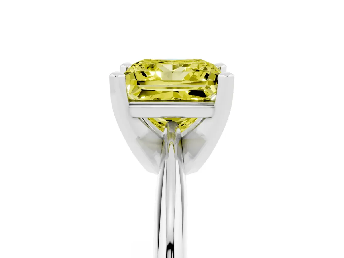 Fancy Yellow Princess Cut Cut Solitaire Ring with Four-Prong Setting on a Classic Band Silver