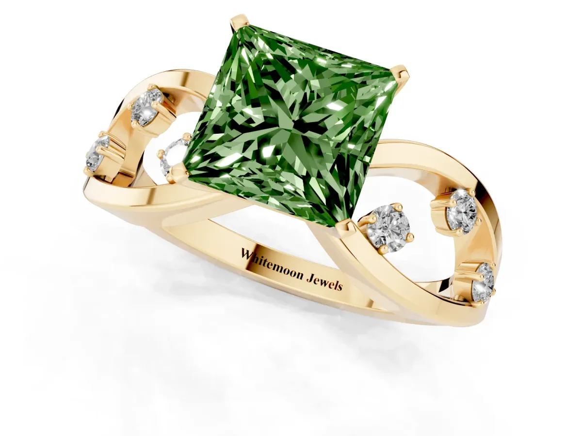 Fancy Green Princess Cut Cut Solitaire Diamond with Side Stones on Criss-Cross Band and Four-Prong Setting Yellow gold