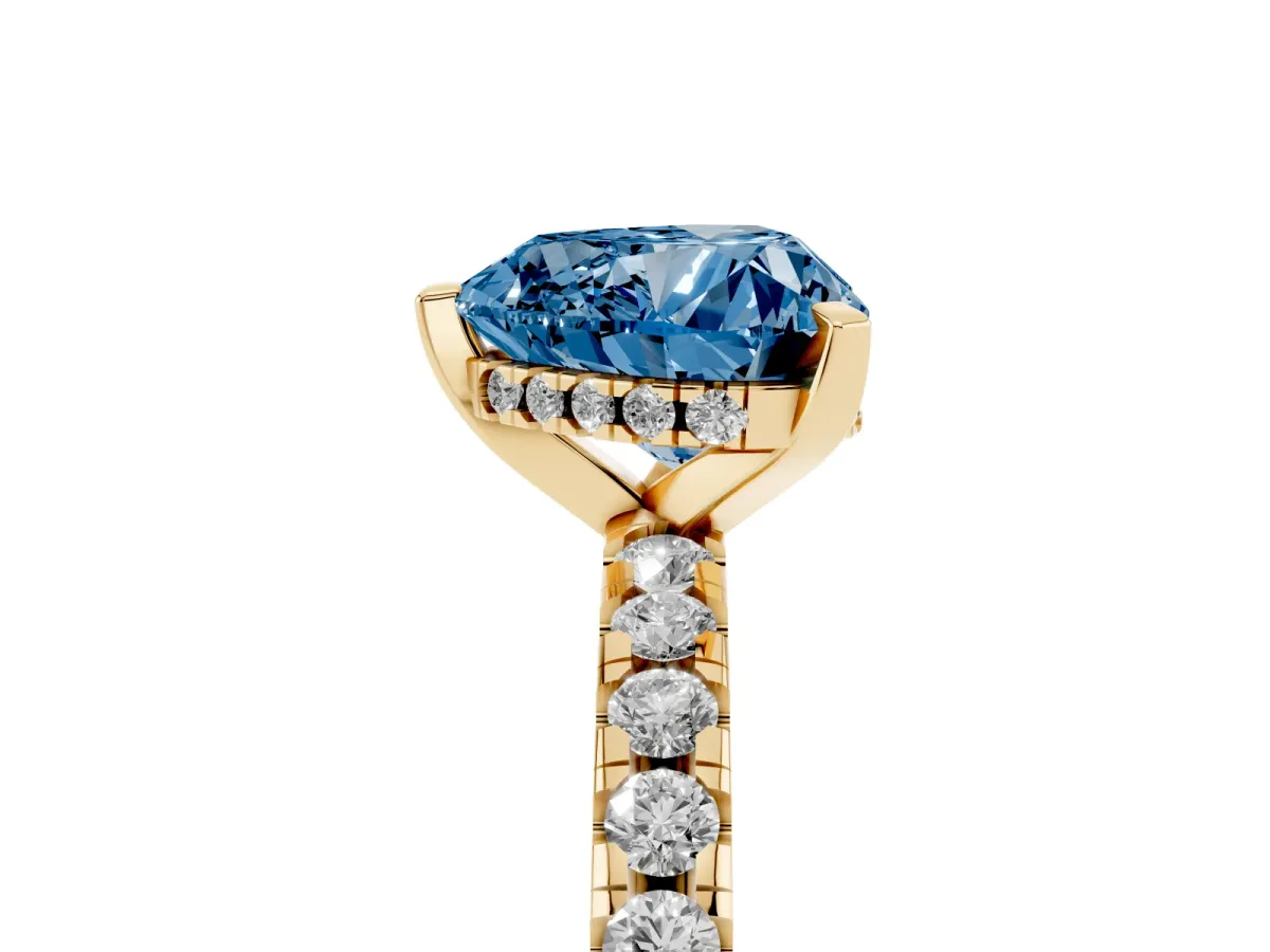 Fancy Blue Heart Cut Diamond Solitaire Ring with Round Pavé Band and Four-Prong Setting Yellow gold