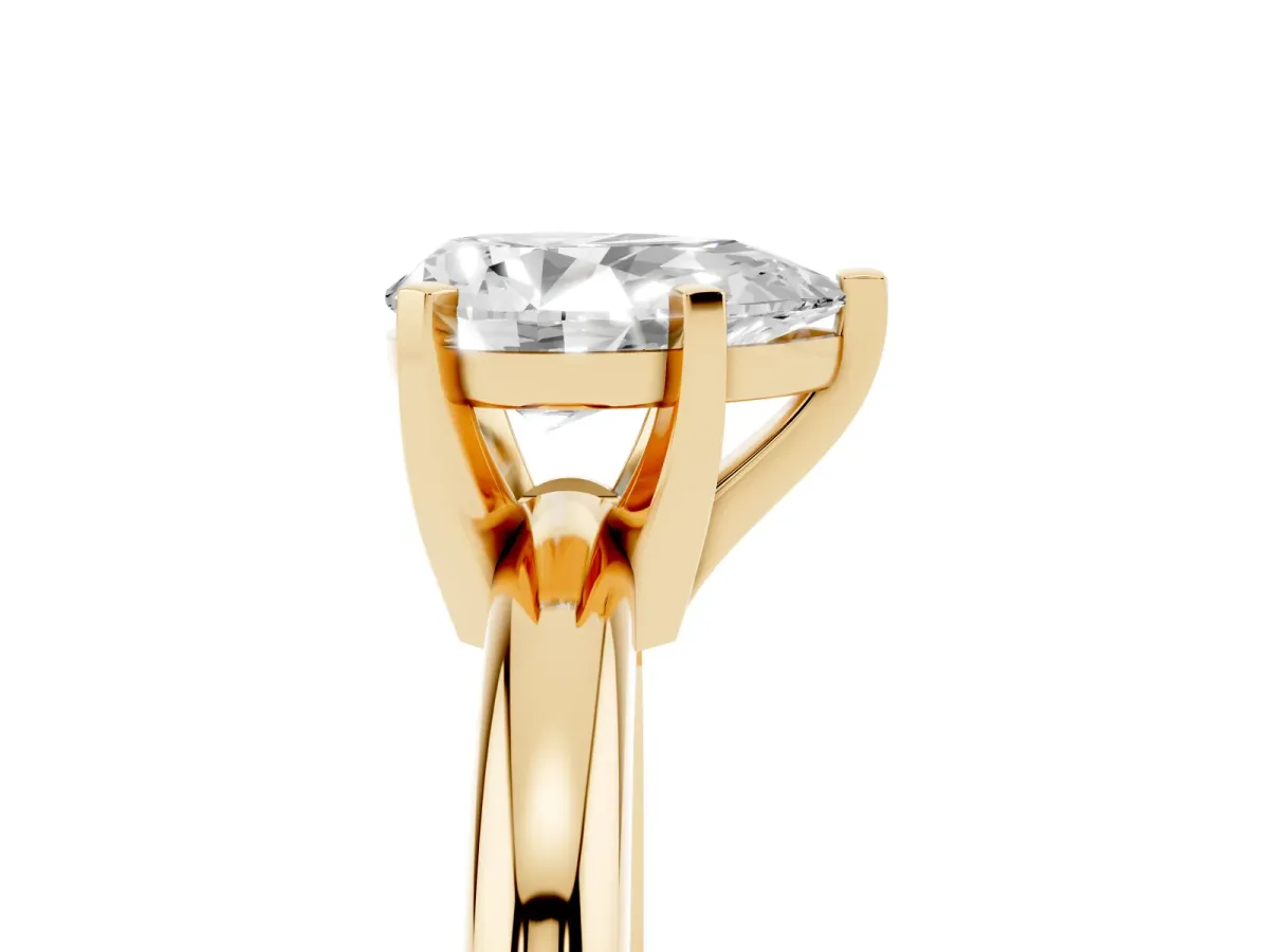 Pear Cut Diamond Solitaire Engagement Ring with Round Band and Four-Prong Setting Yellow gold
