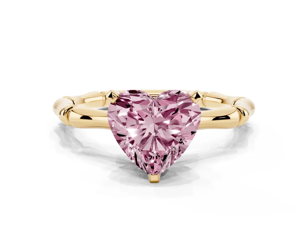 Fancy Pink Heart Cut Solitaire Diamond Ring with Bamboo Band and Four-Prong Setting Yellow gold