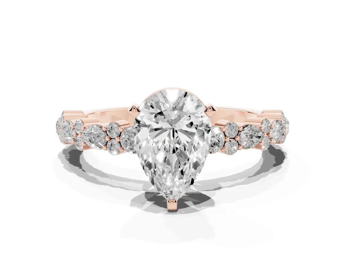 Pear Cut Diamond Side Stone Solitaire Ring with Round and Four-Prong Setting Rose gold