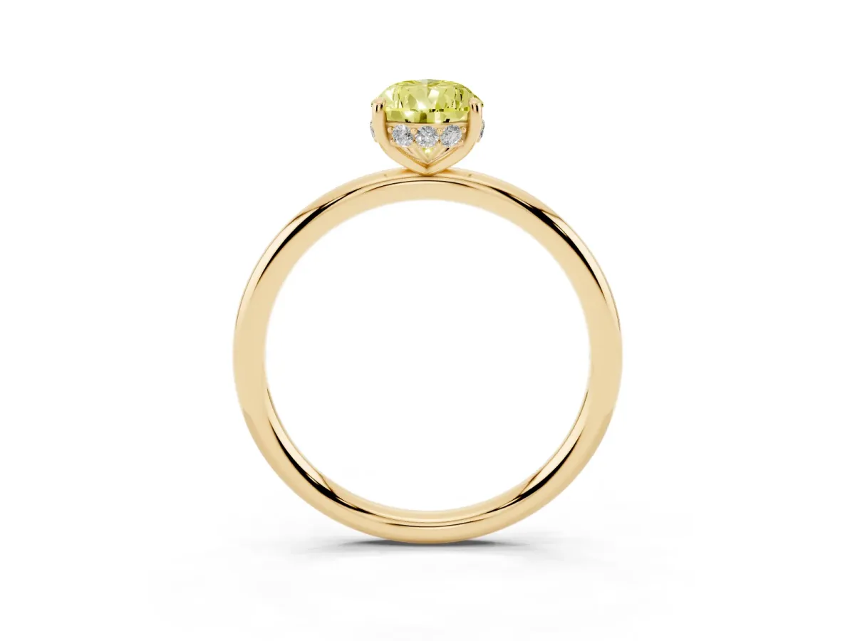Fancy Yellow Pear Cut Solitaire Diamond Ring with a Classic Band and Four-Prong Setting Yellow gold