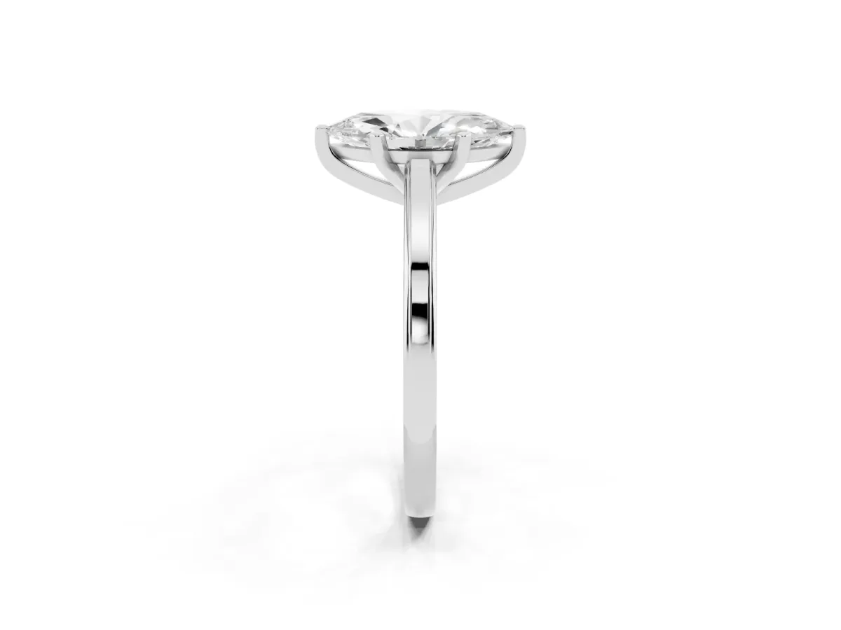 Marquise Cut Solitaire Diamond Ring with Four-Prong Setting and Classic Band Silver