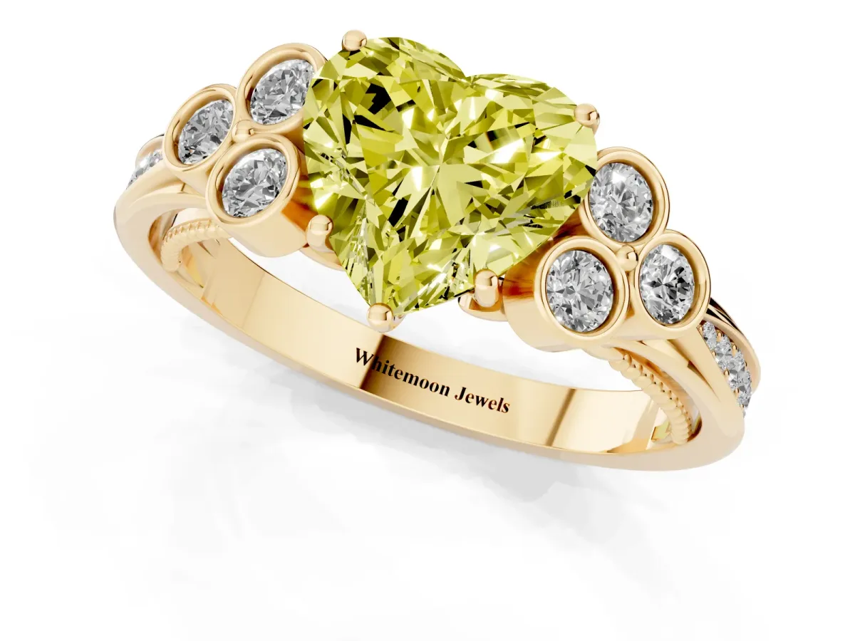 Fancy Yellow Heart Cut Cut Diamond Engagement Ring with Bezel Set Round Side Stones and Prong Setting Yellow gold