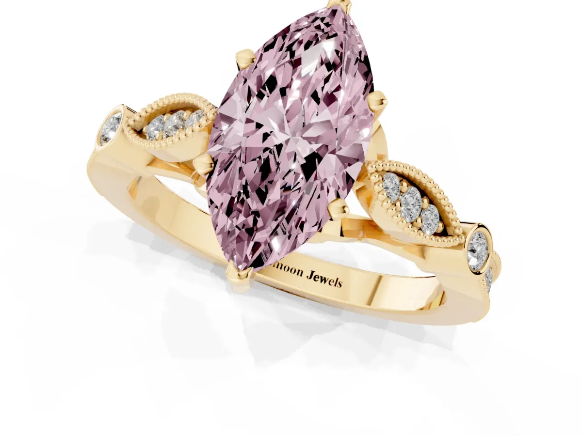 Fancy Pink Marquise Cut Cut Diamond with Milgrain Marquise and Bezel Accents on a Solitaire Band with Prong Setting Yellow gold