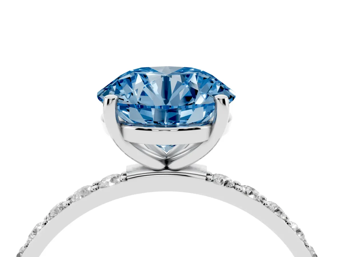Fancy Blue Round Cut Diamond Solitaire Ring with Round Pavé Shoulders and Prong Setting Silver