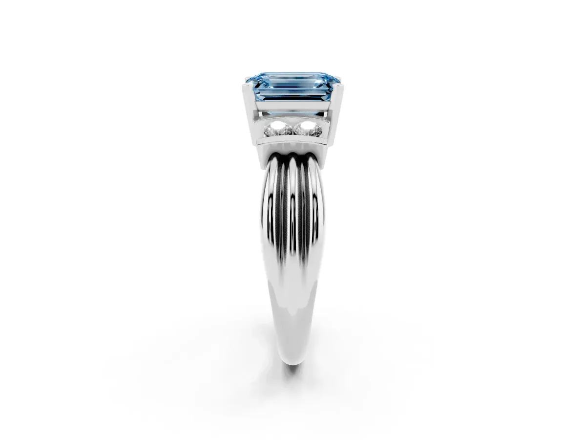 Fancy Blue Emerald Cut Cut Three-Stone Channel Set Ring with Bar Prongs Platinum