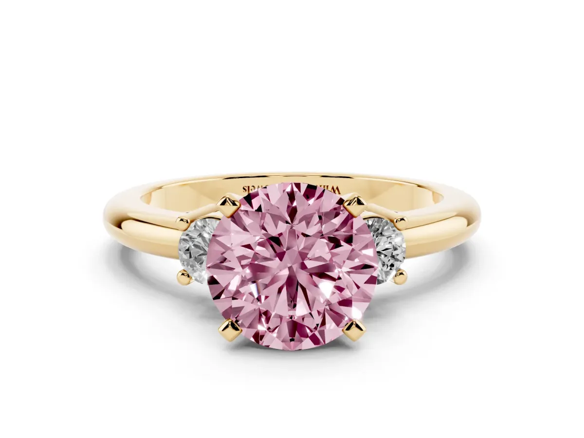 Fancy Pink Three-Stone Round Cut Cut Diamond Solitaire with Prong Setting and Classic Band Yellow gold