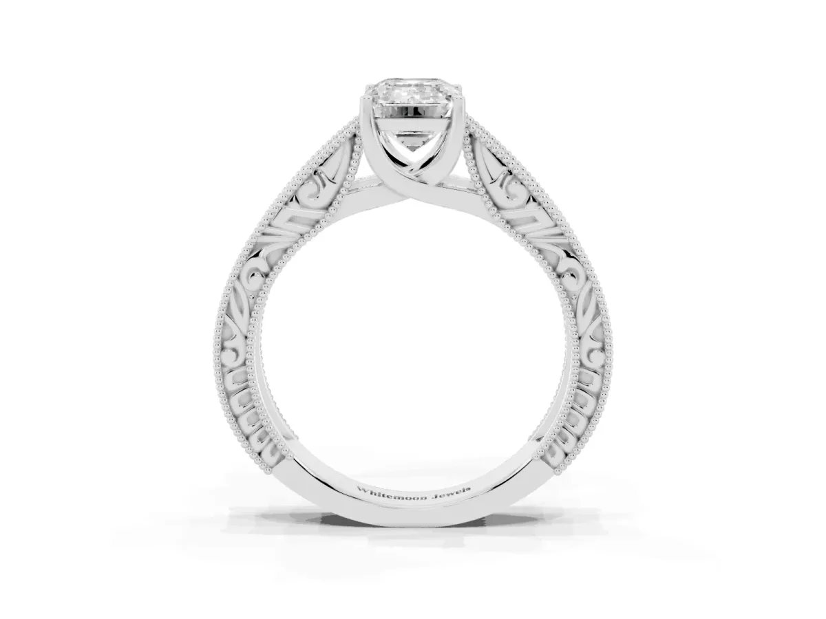 Emerald Cut Diamond Solitaire Ring with Engraved Band and Four-Prong Setting Platinum
