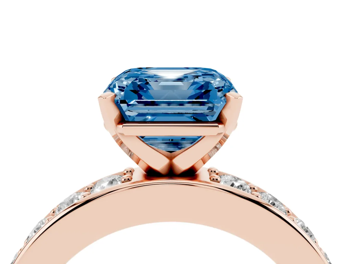 Fancy Blue Asscher Cut Diamond Engagement Ring with Channel Set Round Band and Prong Setting Rose gold