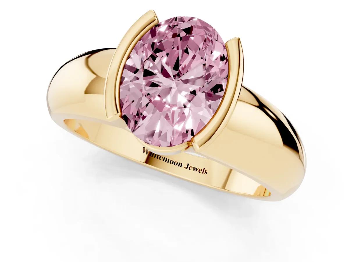 Fancy Pink Oval Cut Solitaire Tension Set Diamond Ring with Wide Band Yellow gold