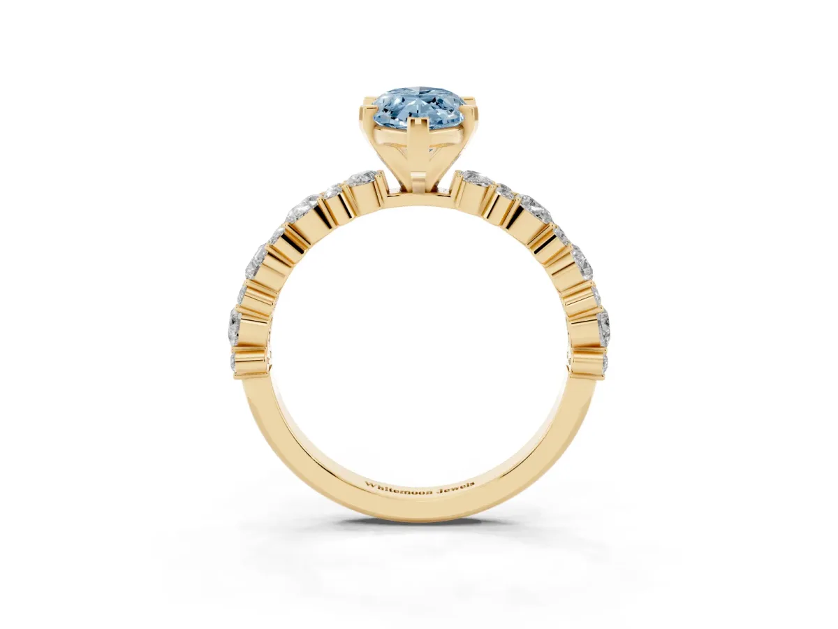 Fancy Blue Marquise Cut Diamond Side Stone Solitaire Ring with Round and Four-Prong Setting Yellow gold