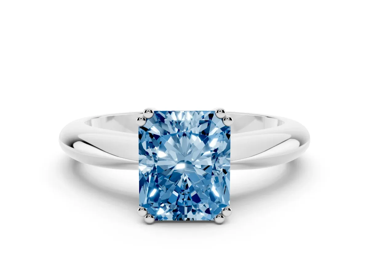 Fancy Blue Radiant Cut Cut Solitaire Engagement Ring with Tapered Band and Four-Prong Setting White gold