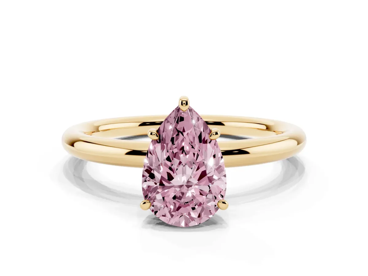 Fancy Pink Pear Cut Solitaire Diamond Ring with Four-Prong Setting on a Plain Band Yellow gold