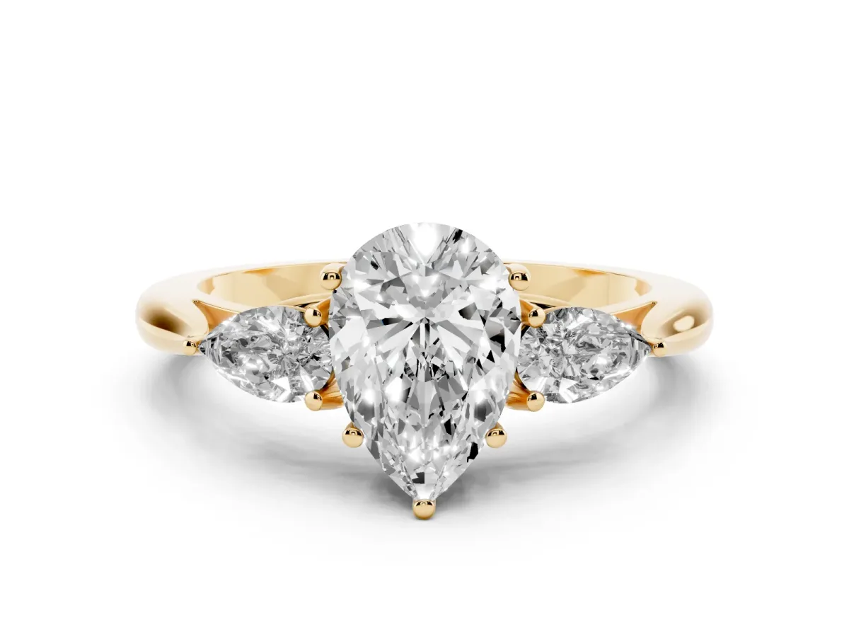 Three-Stone Pear Cut Brilliant Diamond Solitaire Ring with Tapered Band and Four-Prong Setting Yellow gold