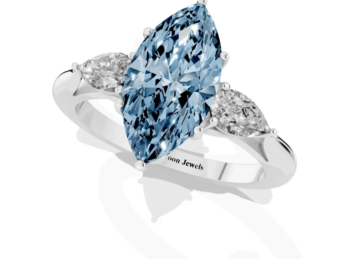 Fancy Blue Three-Stone Marquise Cut Brilliant Diamond Solitaire Ring with Tapered Band and Four-Prong Setting White gold