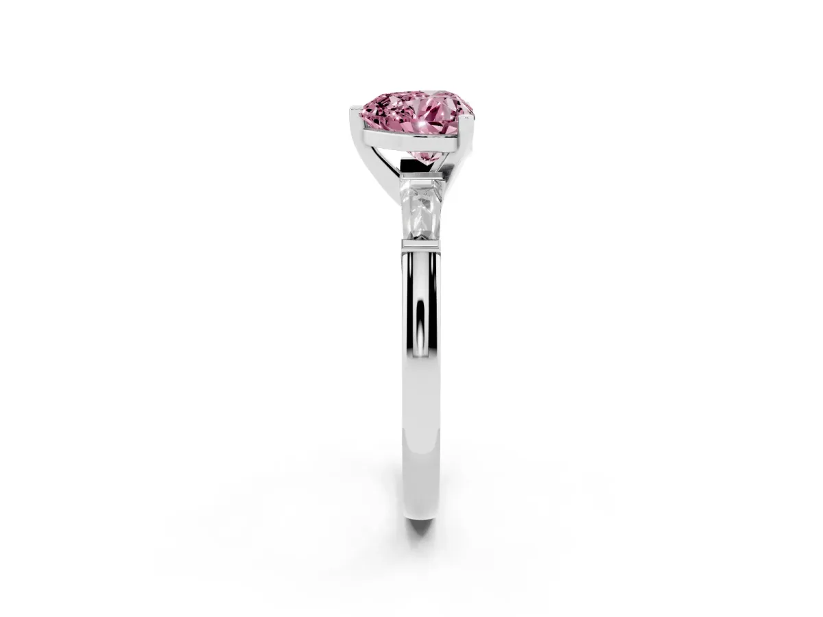 Fancy Pink Heart Cut Solitaire with Tapered Baguette Side Stones on a Classic Band with Four-Prong Setting Silver
