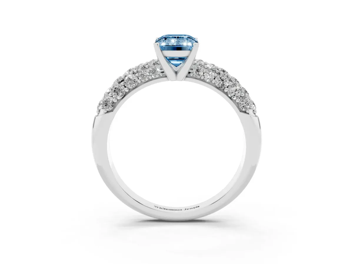 Fancy Blue Emerald Cut Diamond Pavé Band Solitaire Ring with Four-Prong Setting Silver