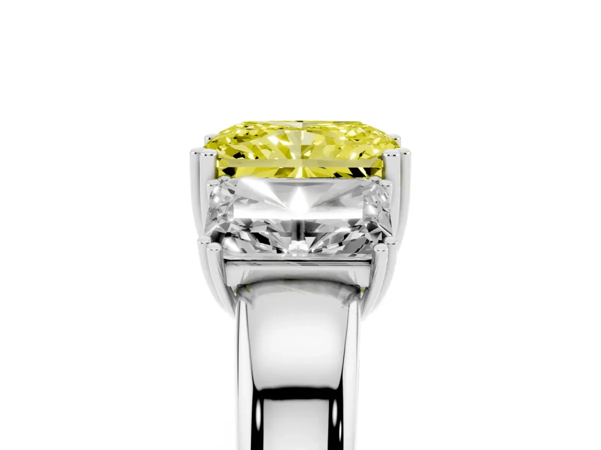 Fancy Yellow Three-Stone Radiant Cut Cut Diamond Ring with Channel Set Band and Four-Prong Setting Platinum