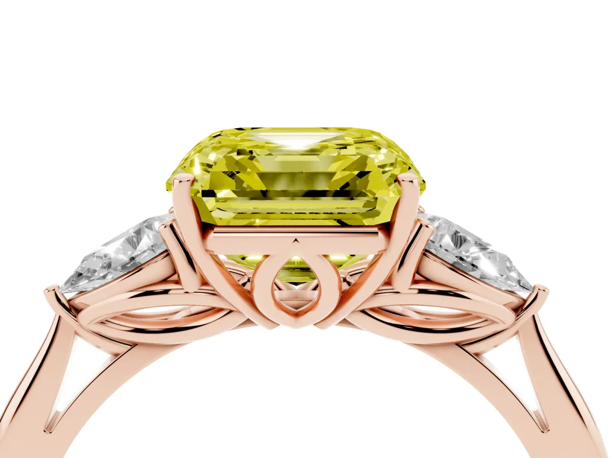 Fancy Yellow Three-Stone Asscher Cut Diamond Ring with Pear Side Stones in Four-Prong Setting Rose gold
