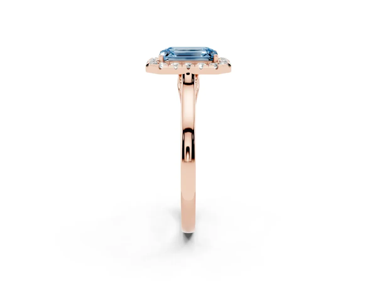 Fancy Blue Emerald Cut Halo Round Diamond Solitaire Ring with Pavé Band and Four-Prong Setting Rose gold
